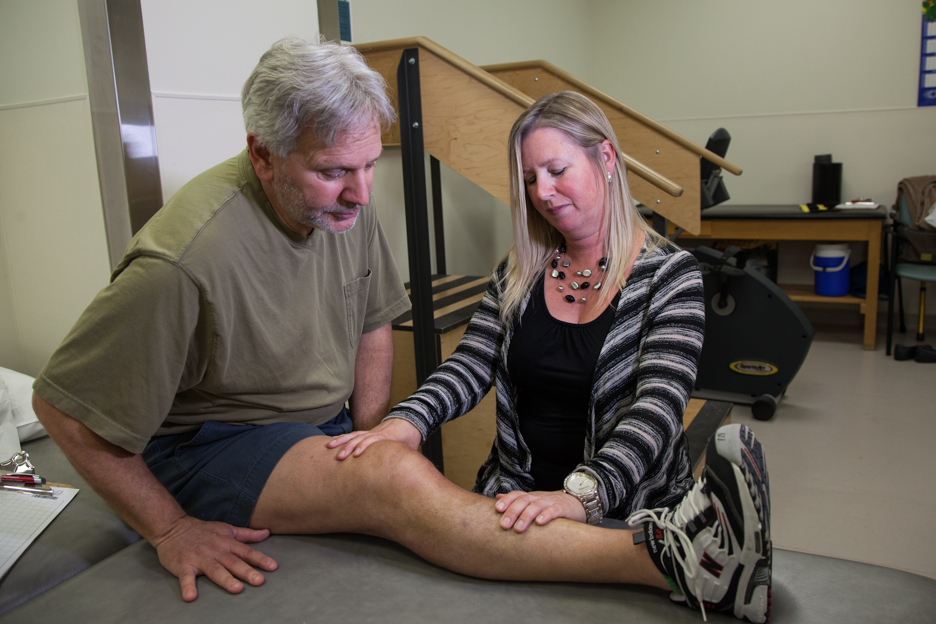 Patient getting their knee assessed