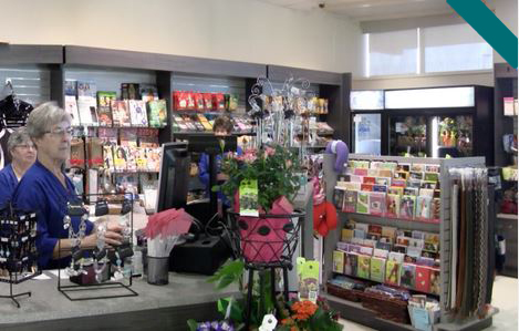 volunteers working in gift shop