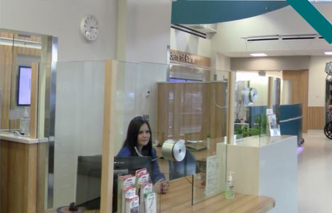 receptionist at lobby desk