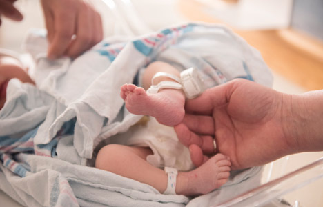 baby with electronic security tag