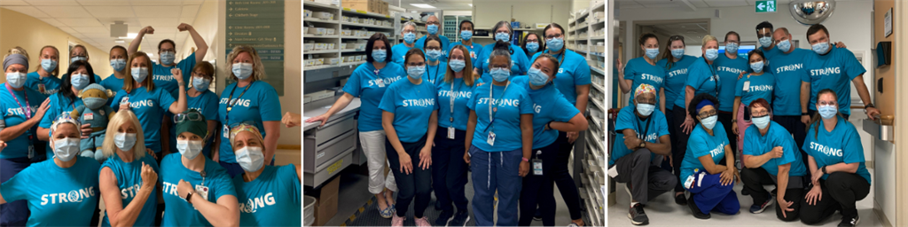 group of QCH staff wearing QCH Strong shirts